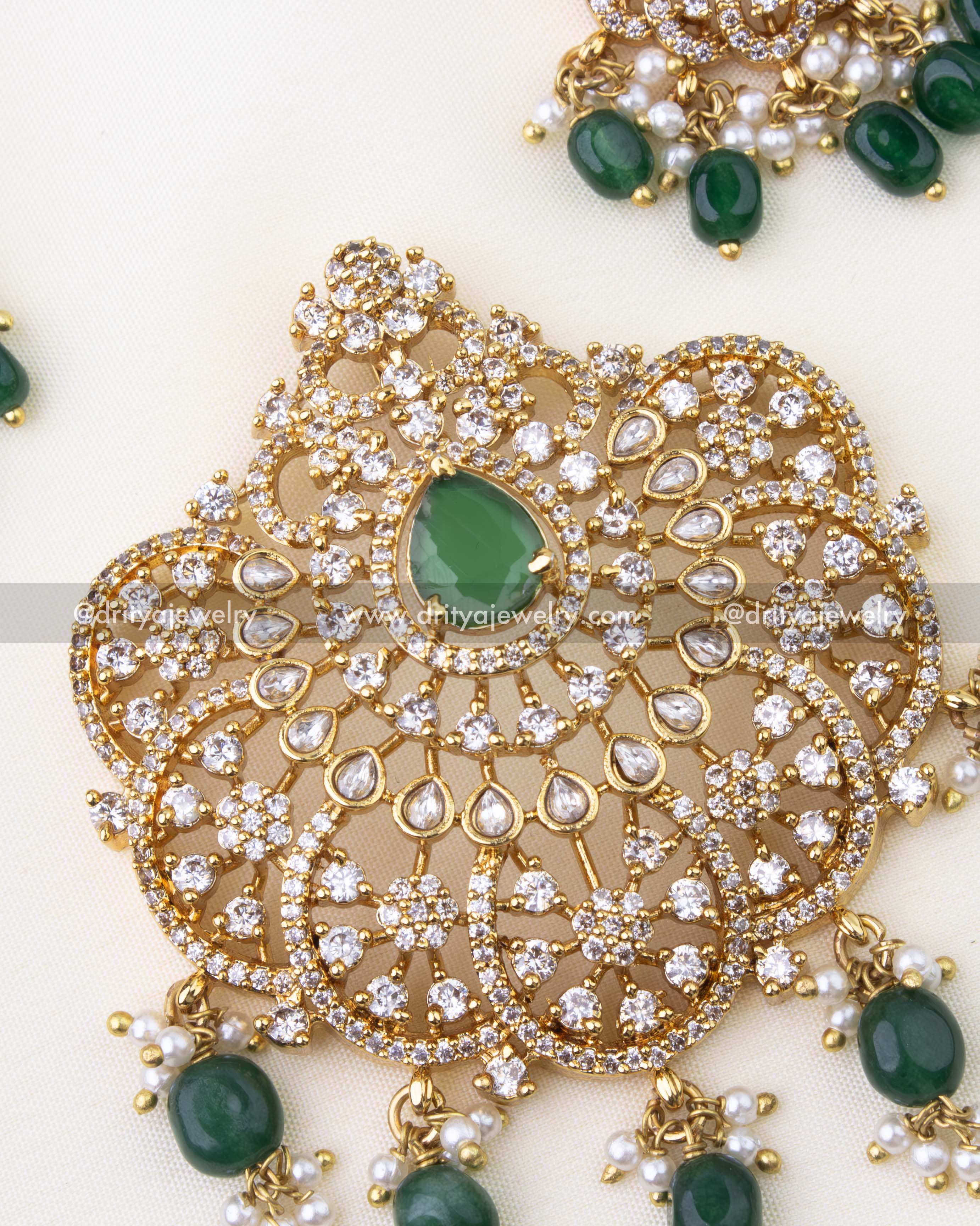 1269-G close-up of emerald green pendant with white stones and bead drops