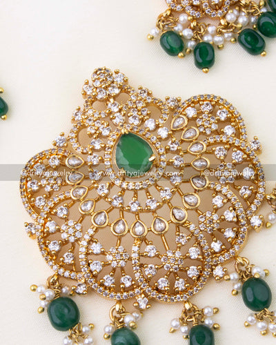 1269-G close-up of emerald green pendant with white stones and bead drops