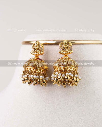 1282 - Close-up of matching antique gold temple jhumka earrings with pearl drops