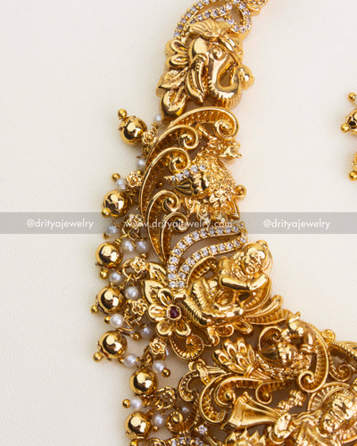 SKU 1121 Necklace Set - Side close-up of nakshi temple necklace with deity and CZ stone detailing