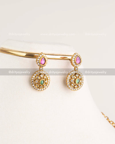 SKU 1153 Necklace Set close-up of matching drop earrings with pear and round stone design