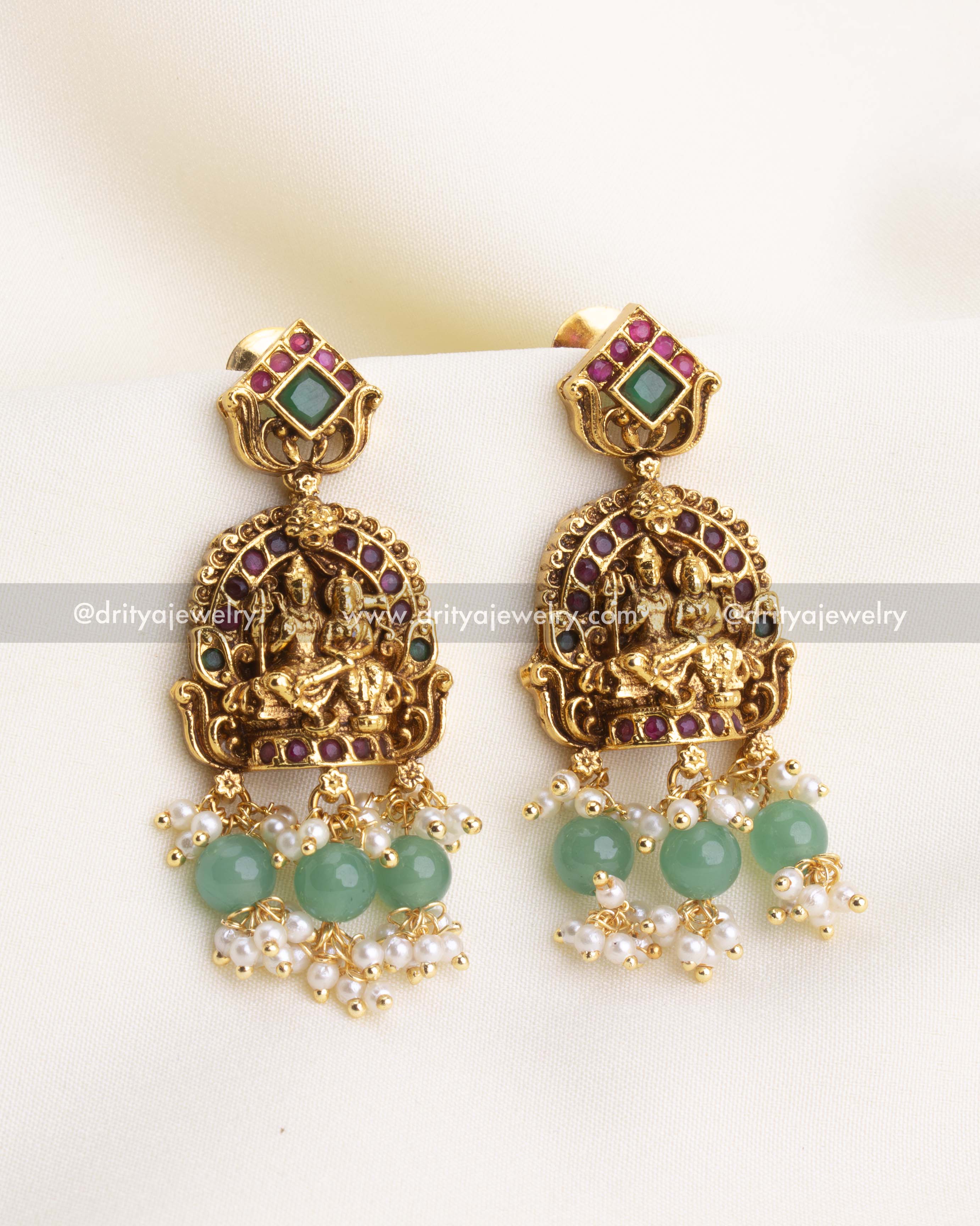1204 - Temple god idol earrings with green beads and pearl drops front view