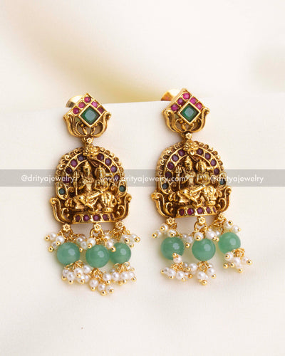 1204 - Temple god idol earrings with green beads and pearl drops front view