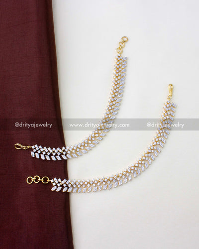 1272 - Pair of diamond replica champaswaralu hair chains laid flat with hooks