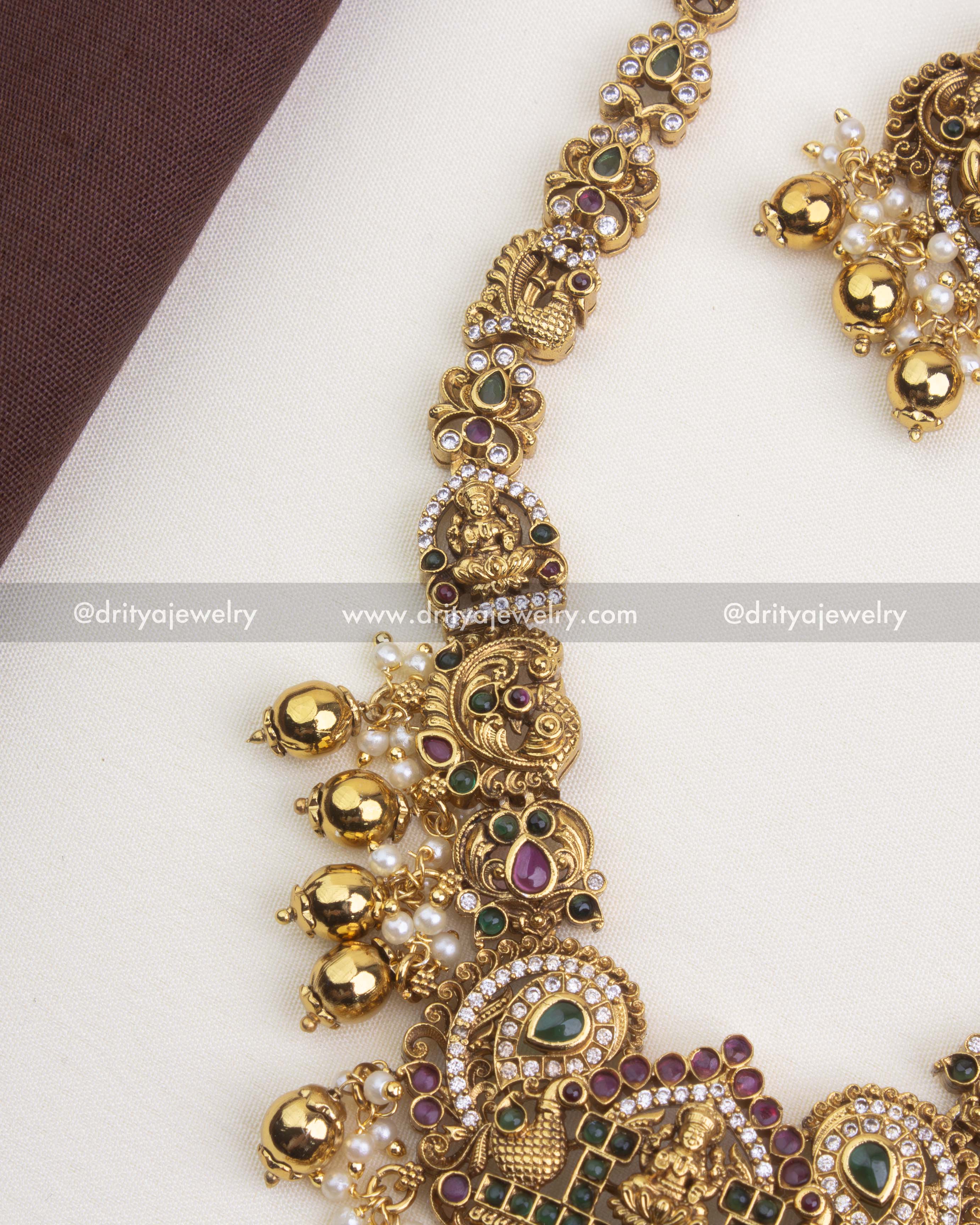 1249-GO necklace side detailing with god idol and peacock motifs