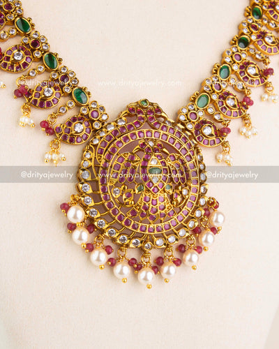1201 - Necklace Set - Close-up of central idol-style pendant with pearl drops
