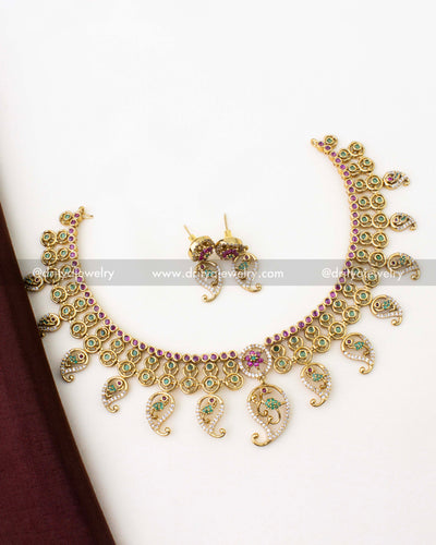 SKU 1290 antique short necklace set with matching earrings laid flat