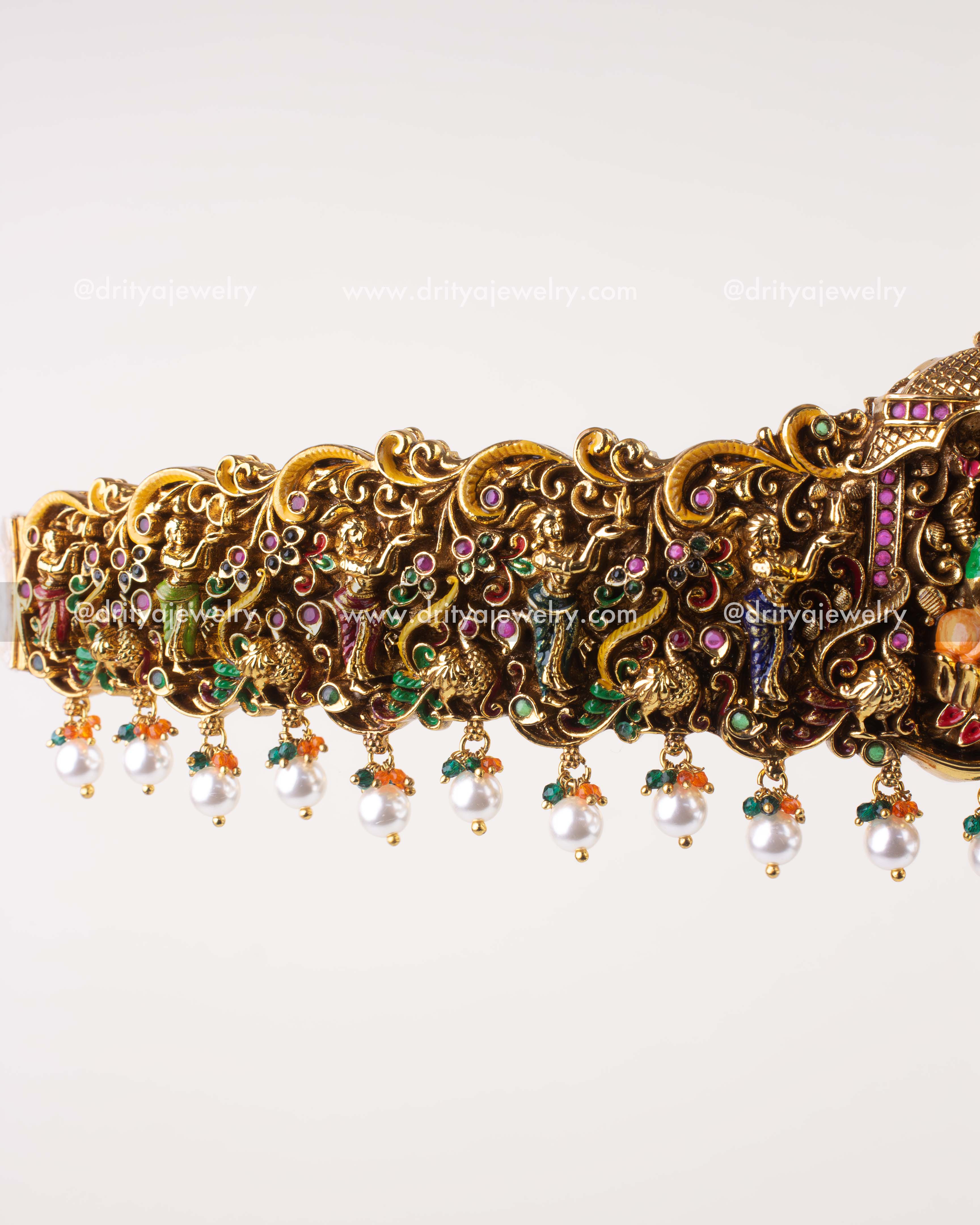 Side close-up of Lakshmi temple nakshi waist belt with pearl and bead drops