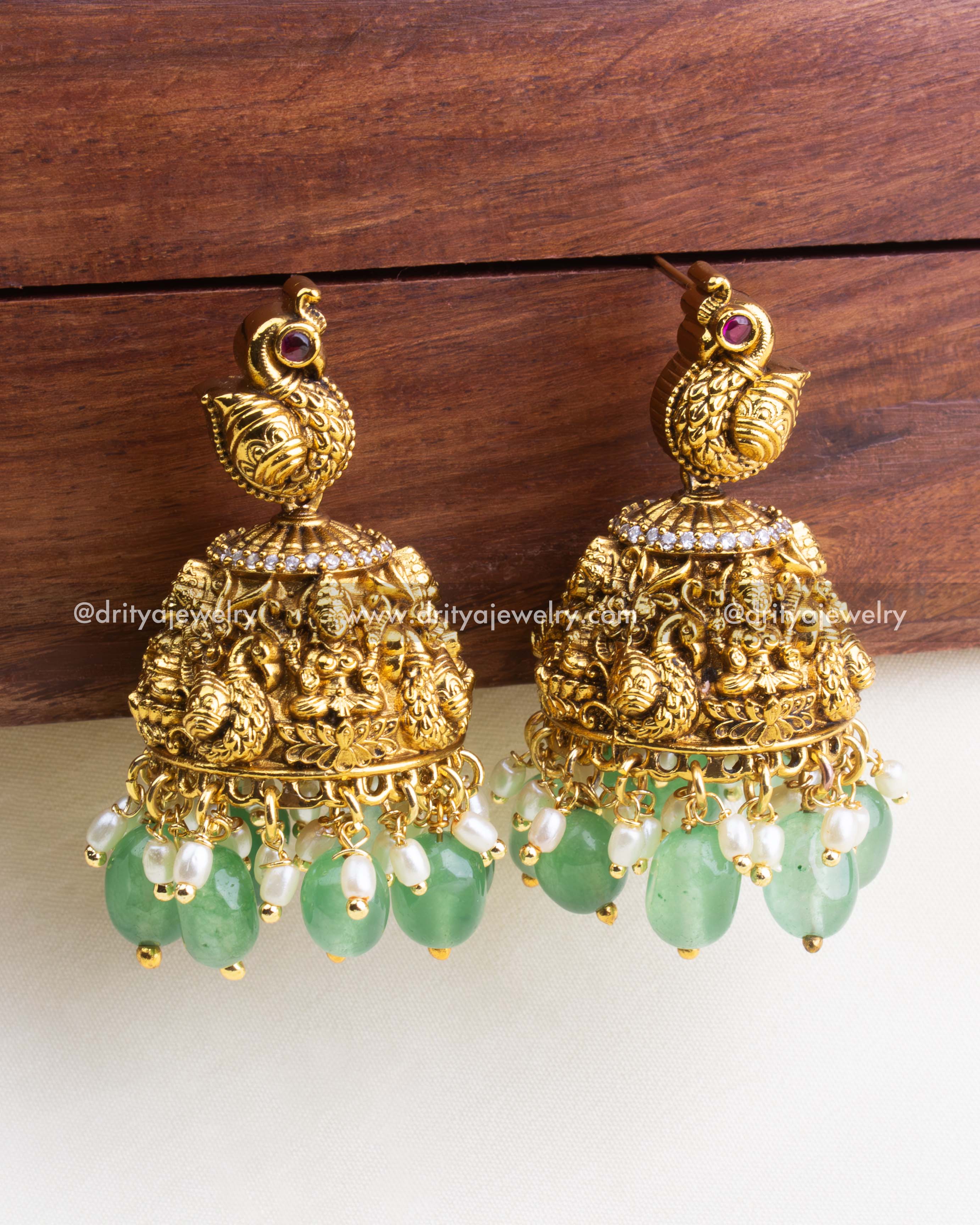 1195 - Temple jhumka earrings with green beads and pearls front view