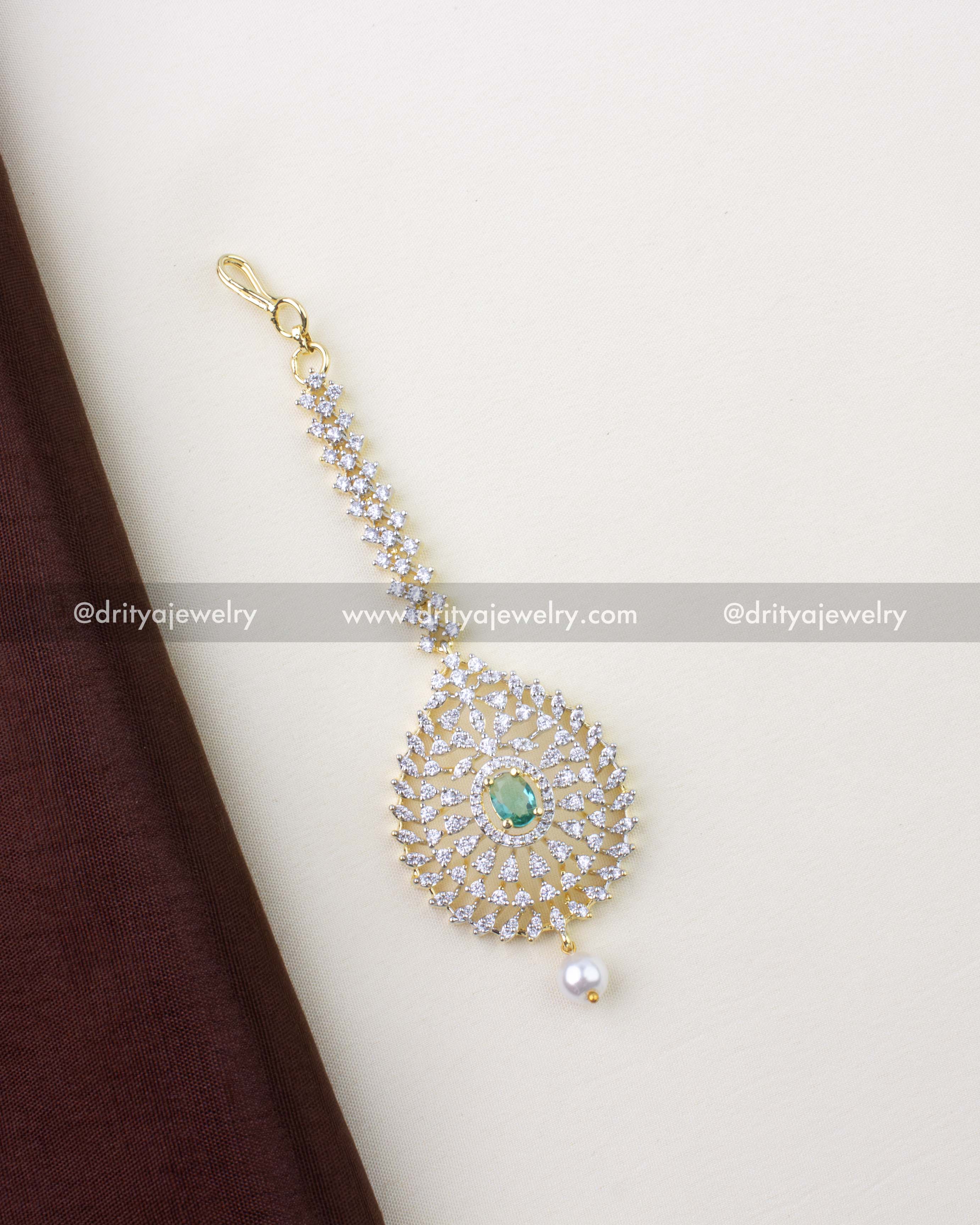 1293-RE premium emerald and CZ maang tikka full view with pearl drop