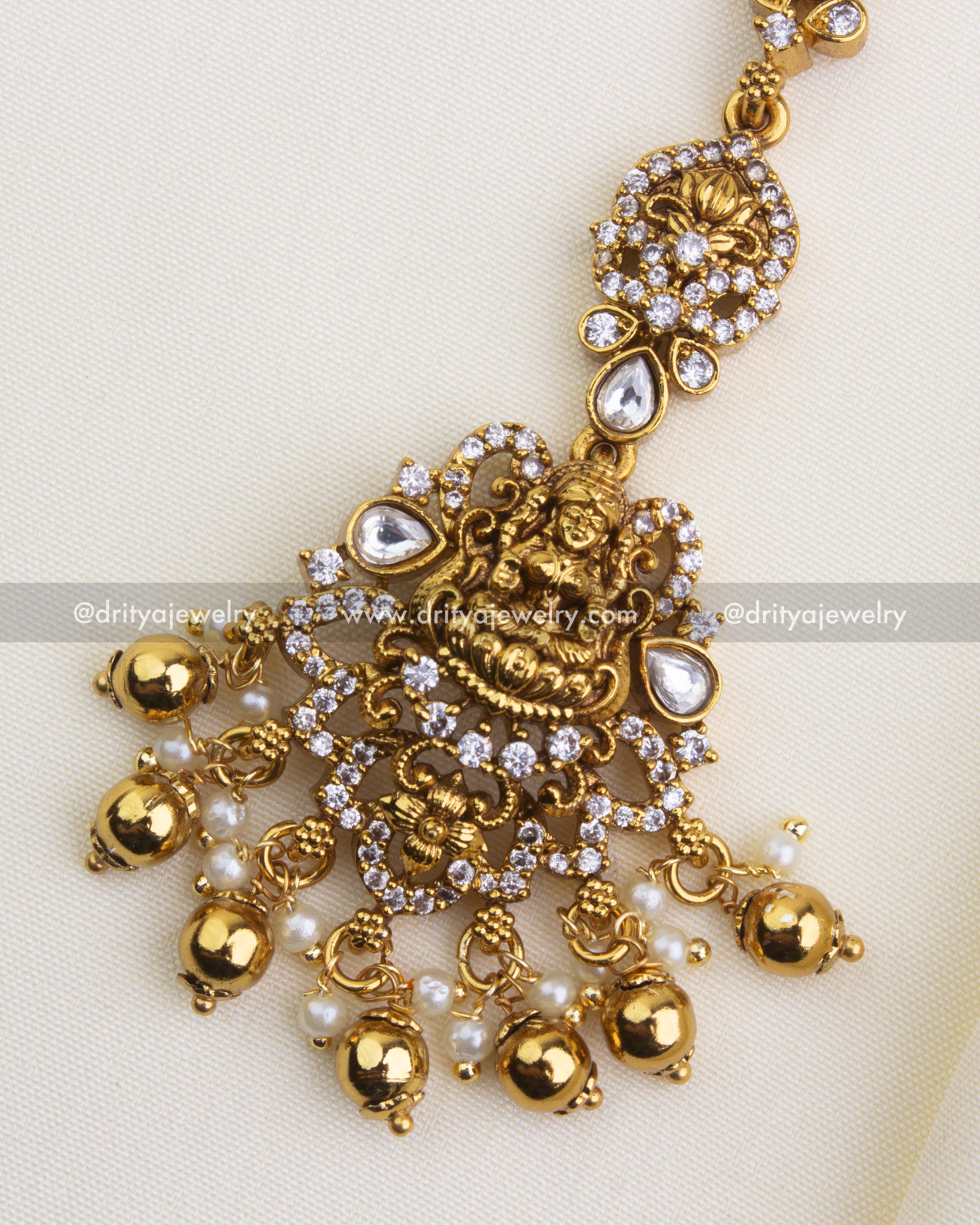 1147 - Maang Tikka - Close-up front view showing god idol motif, kundan stones and bead drops