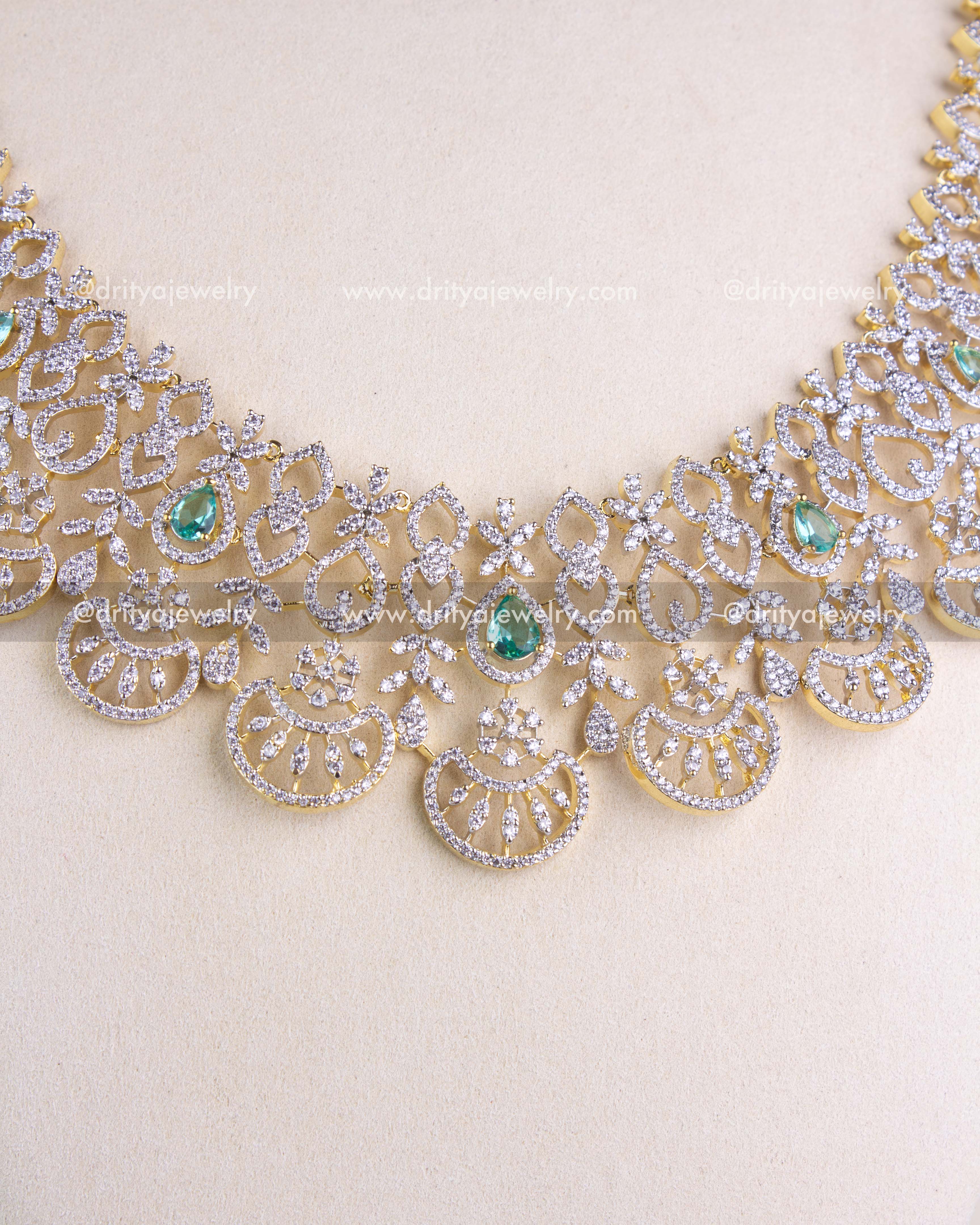 1208-RE front section of bridal CZ necklace with crescent motifs and emerald drops
