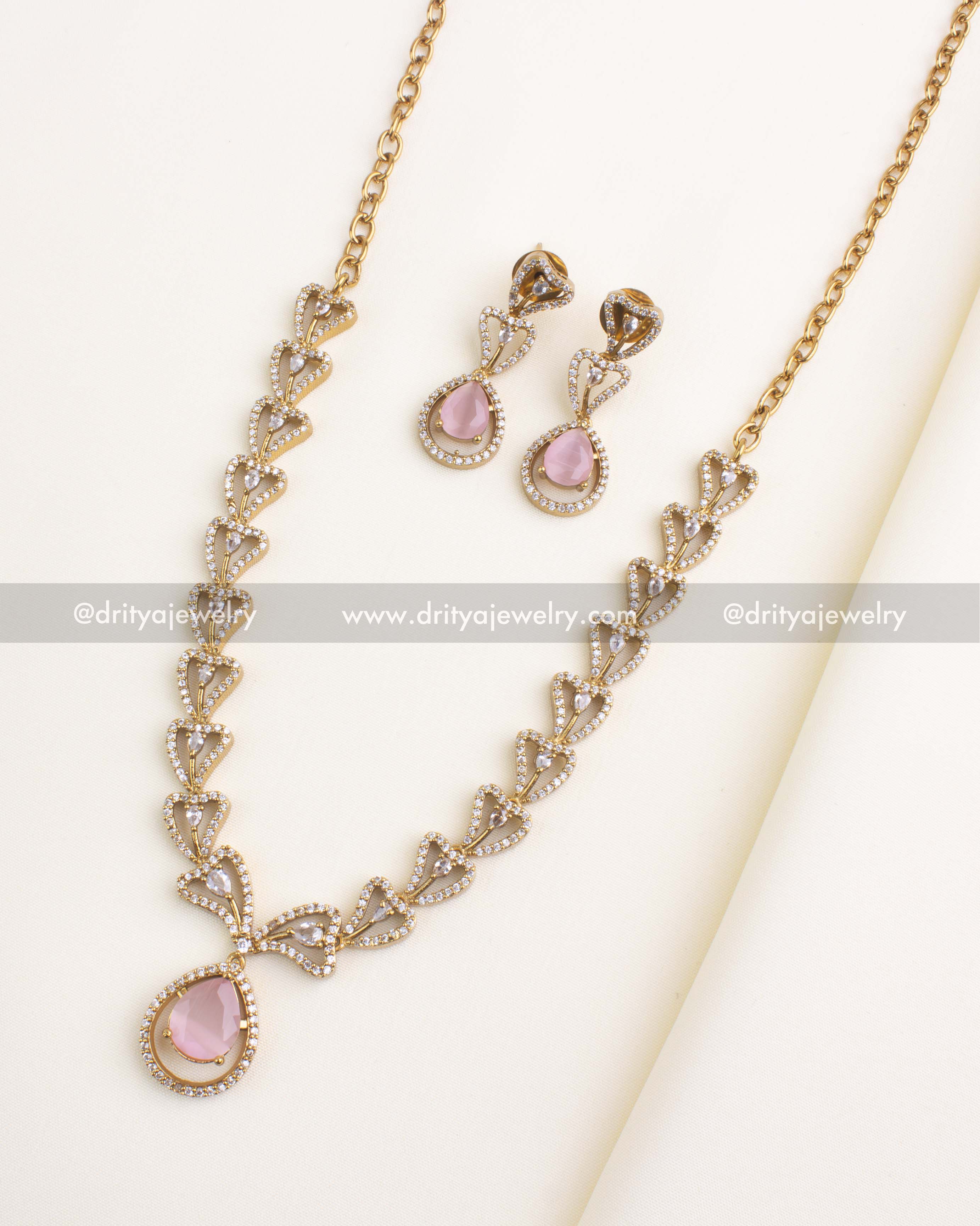 1152-BP - Necklace Set - Full set flat lay showing short necklace and matching earrings
