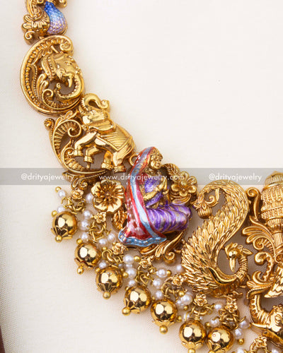 SKU 1262 - Close-up of side motifs on temple necklace with elephant and peacock detailing