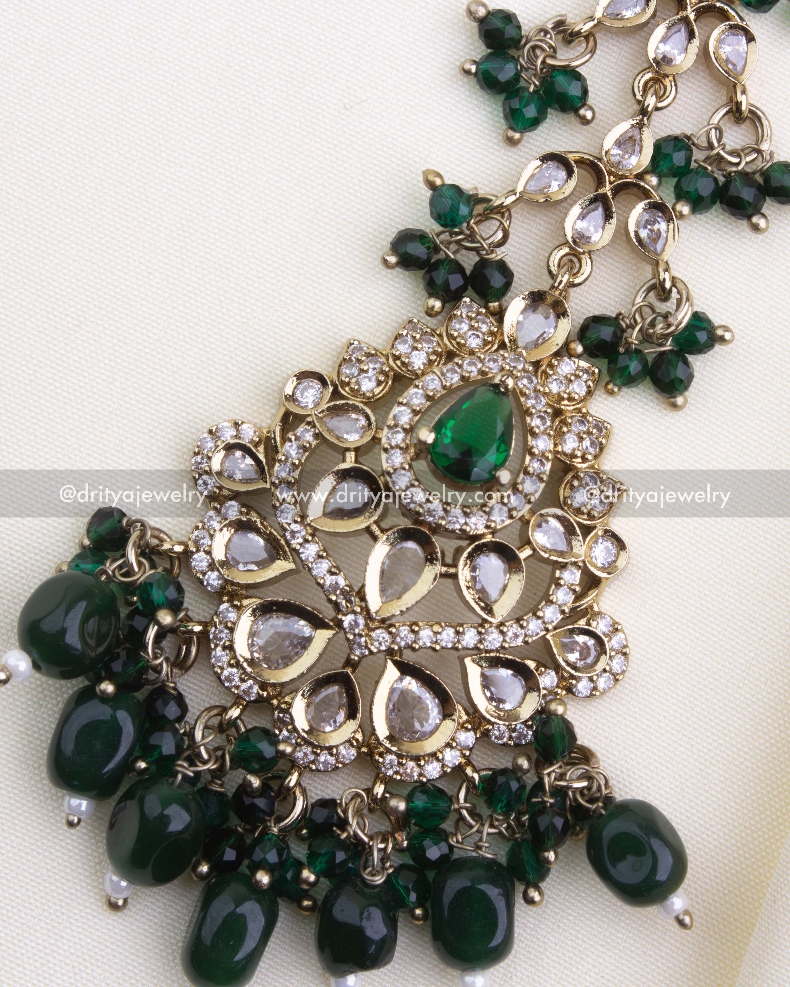 1133-G close-up of emerald maang tikka centerpiece with teardrop stones and bead hangings