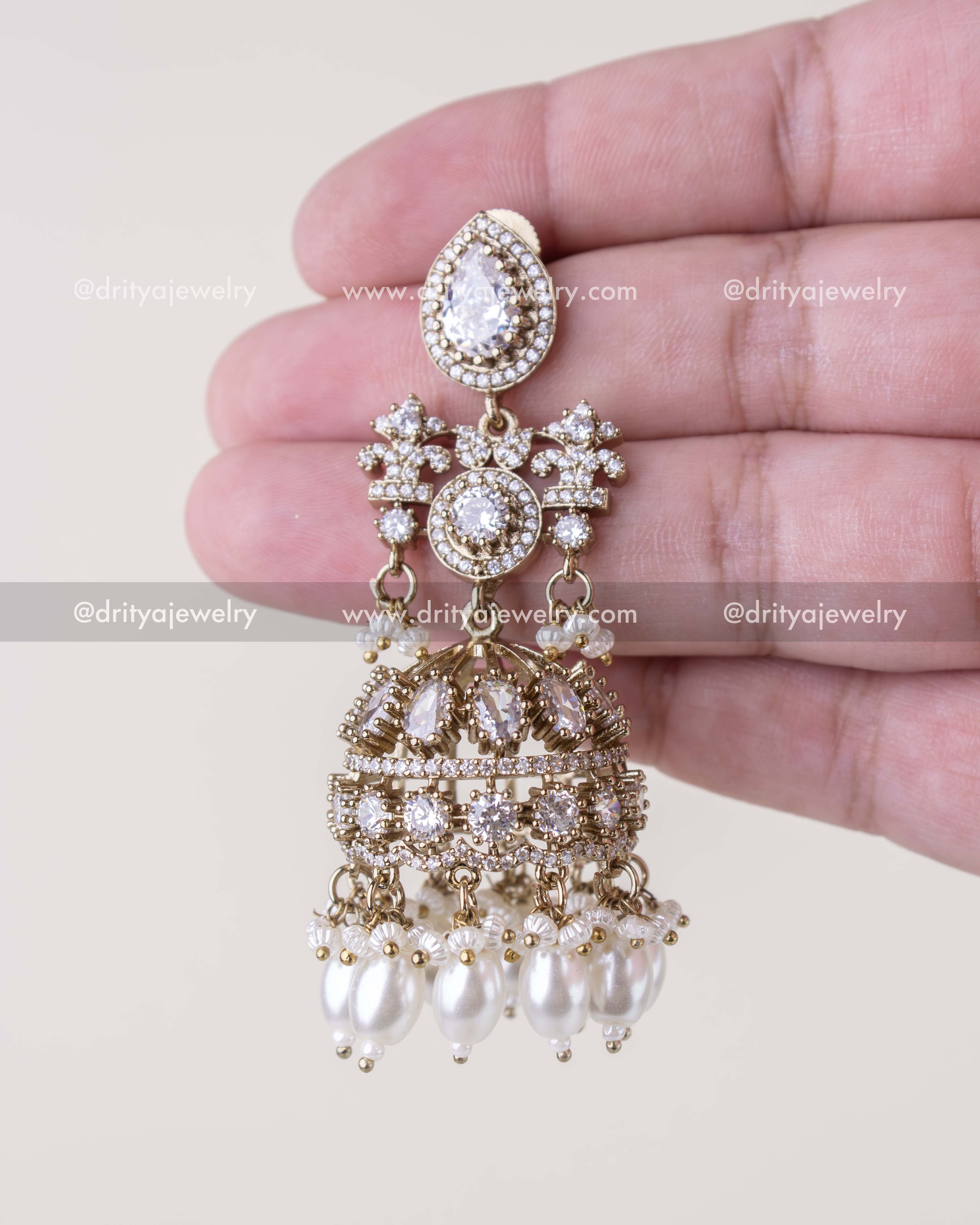 1257-W single Victorian CZ bridal jhumka earring close-up with pearl hangings