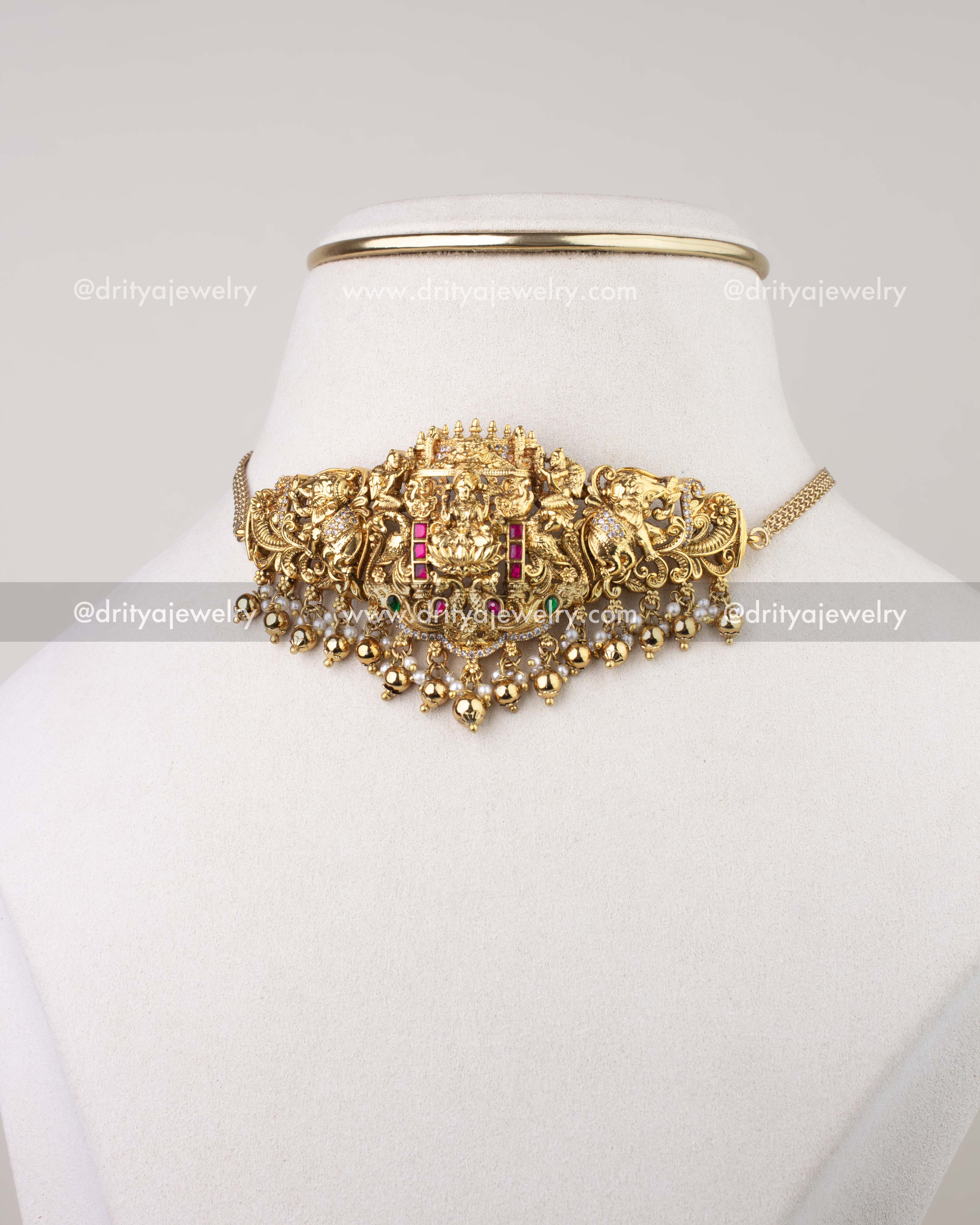 1282 - Full front view of premium temple nakshi choker necklace on display bust