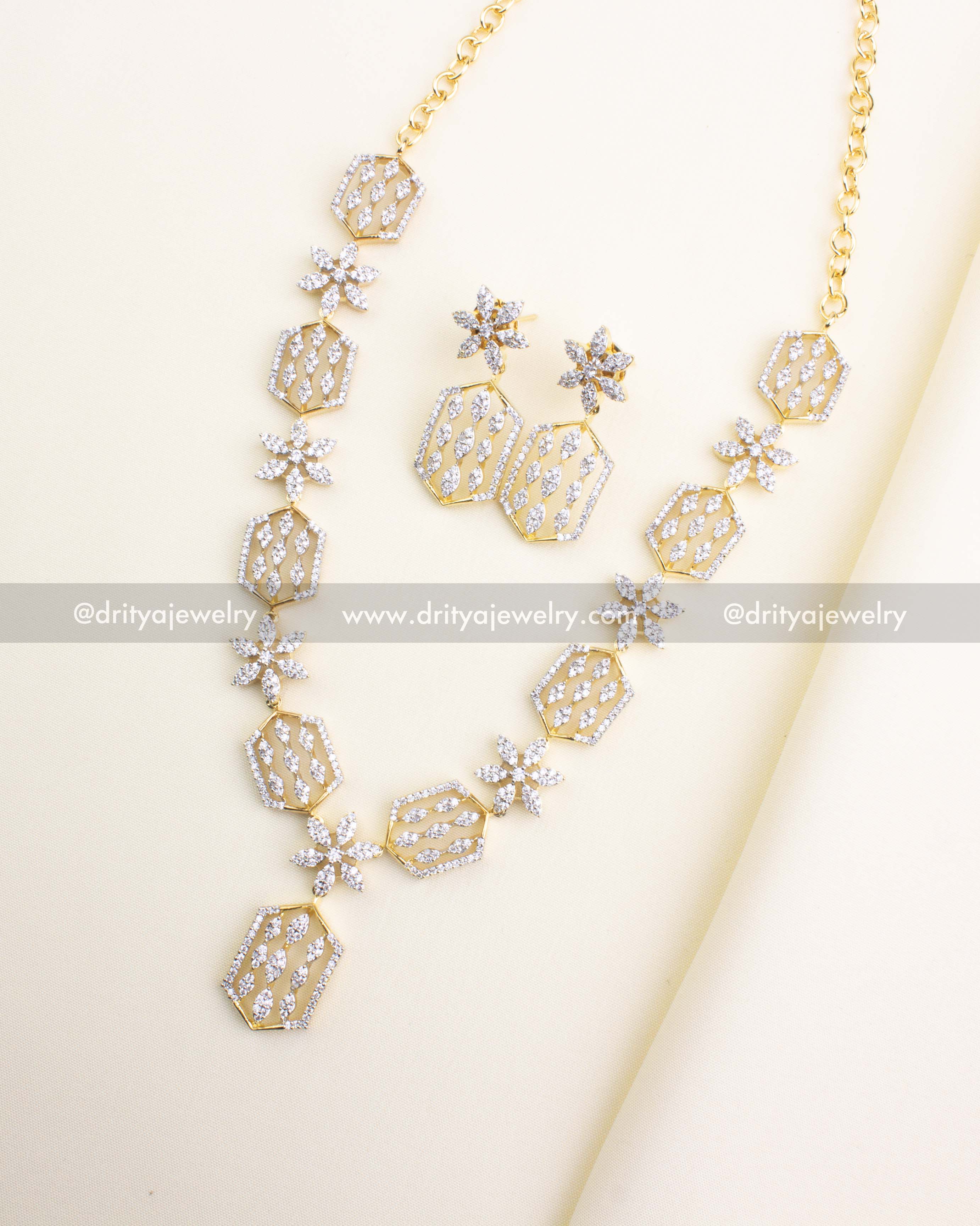SKU 1183 diamond replica short necklace set with matching earrings laid flat front view