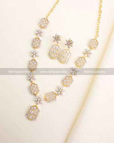 SKU 1183 diamond replica short necklace set with matching earrings laid flat front view