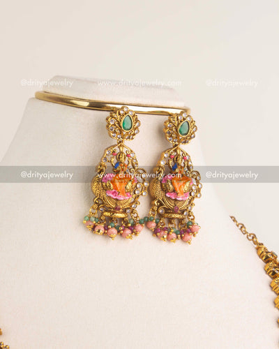1197 Necklace Set close-up of god idol earrings with meenakari work and bead drops
