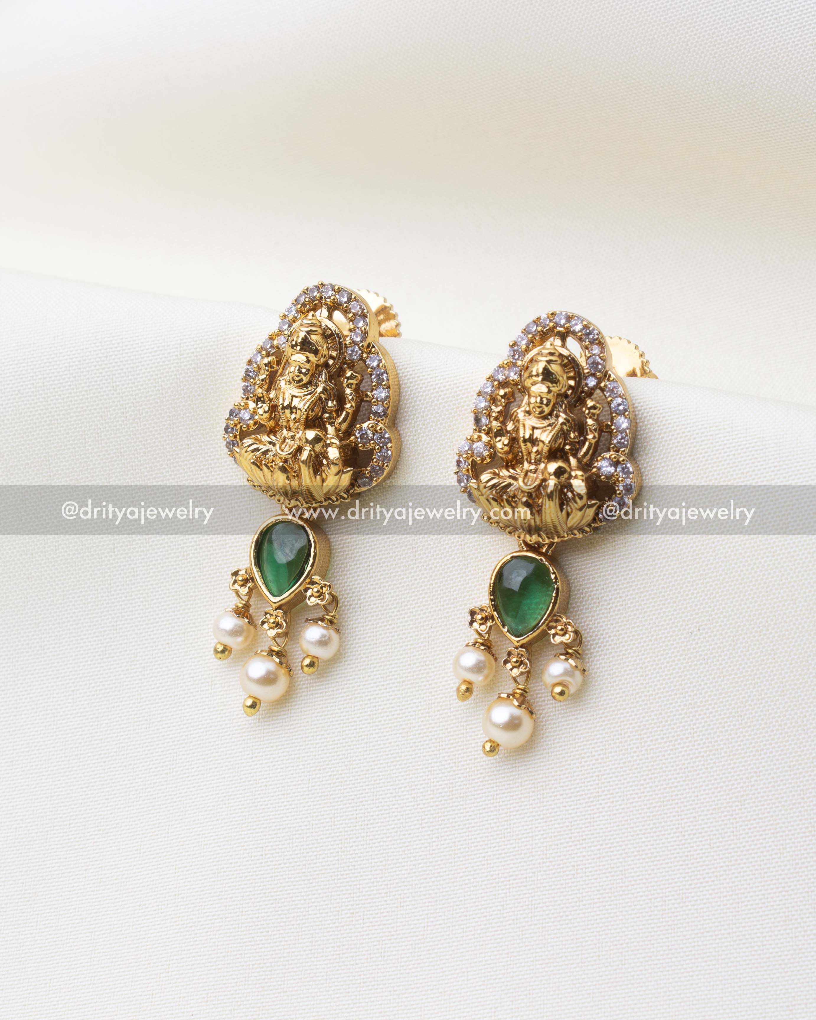 1216-G Lakshmi temple stud earrings with emerald green stone and pearl drops front view