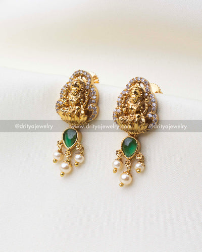1216-G Lakshmi temple stud earrings with emerald green stone and pearl drops front view