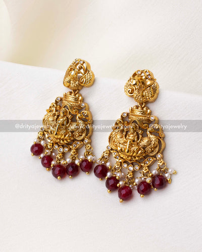 1263-R temple-style god idol earrings with ruby red bead drops front view