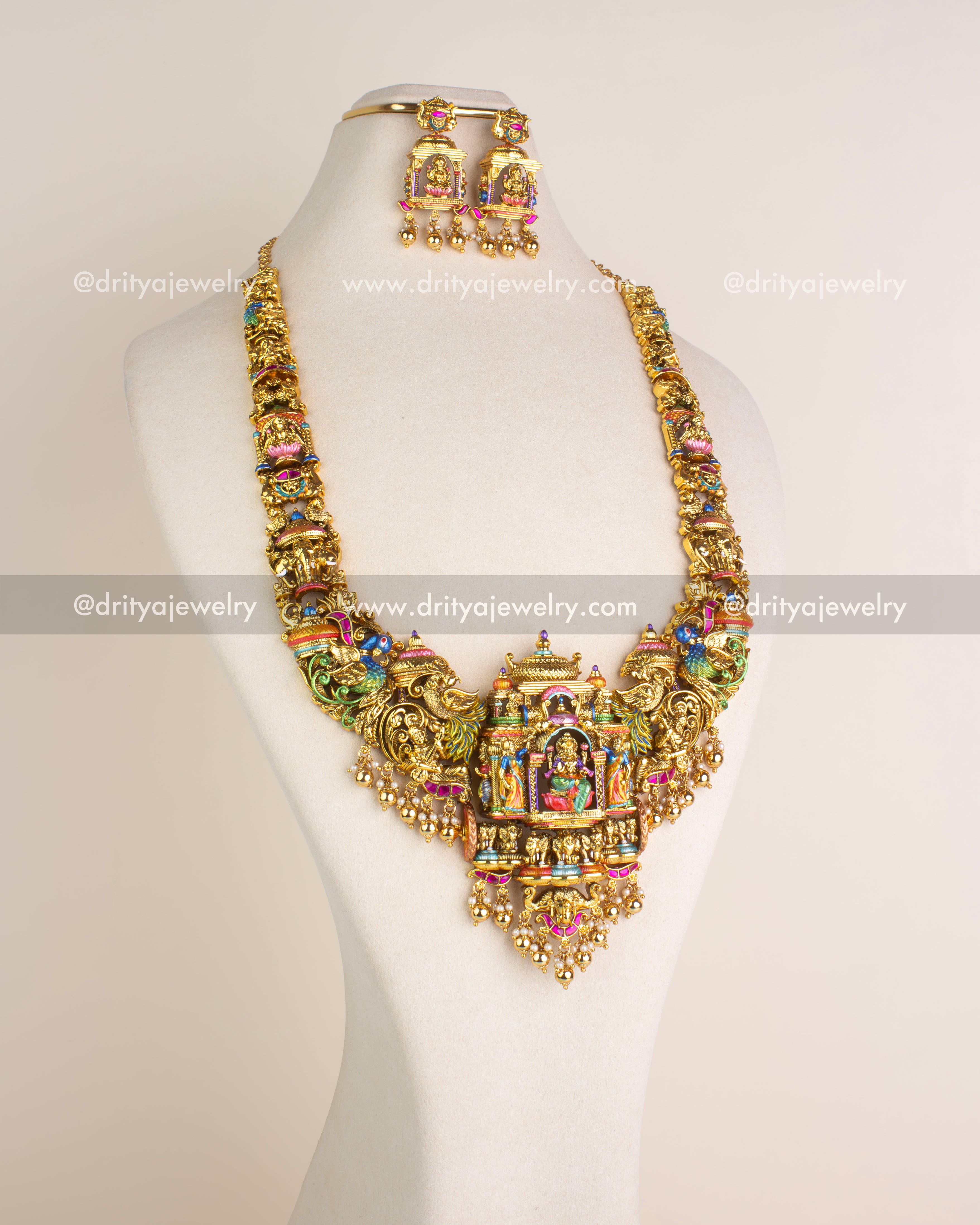 SKU 1118 Necklace Set angled front view showing long temple haram and matching dangler earrings on bust