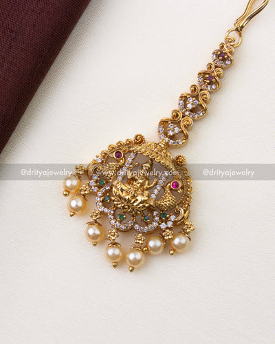SKU 1217 temple god idol maang tikka close-up with pearl hangings