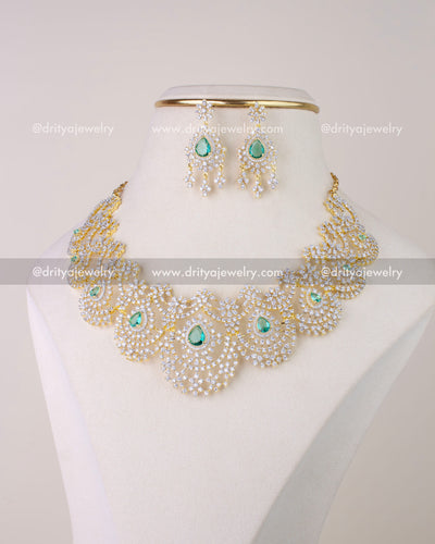 1278-RE emerald CZ necklace set with matching dangler earrings on display bust