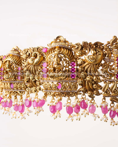 1207-WB close-up of Lakshmi Devi panel with ruby pink stones and bead drops