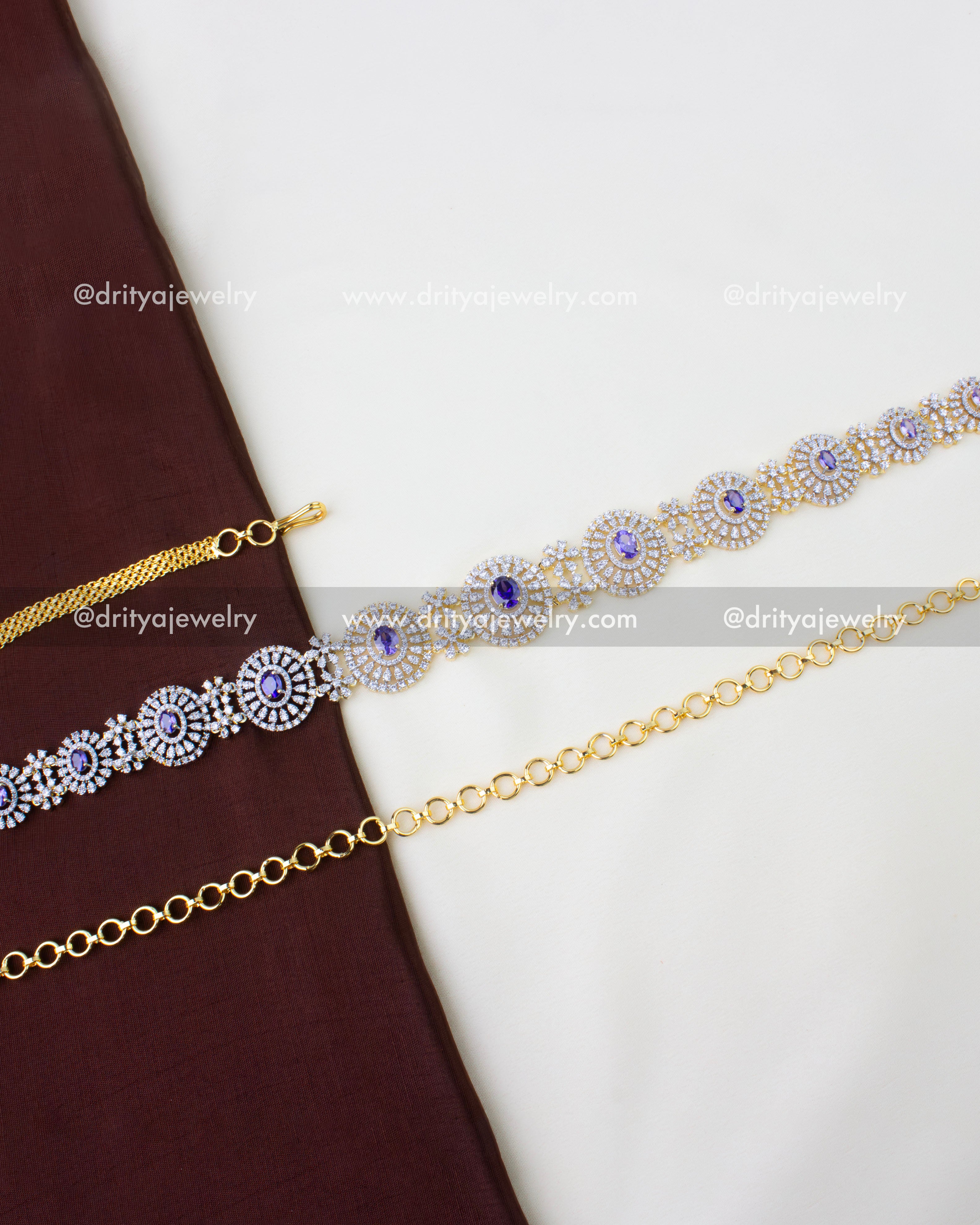 1291-PU premium purple stone CZ hip chain full view laid on fabric