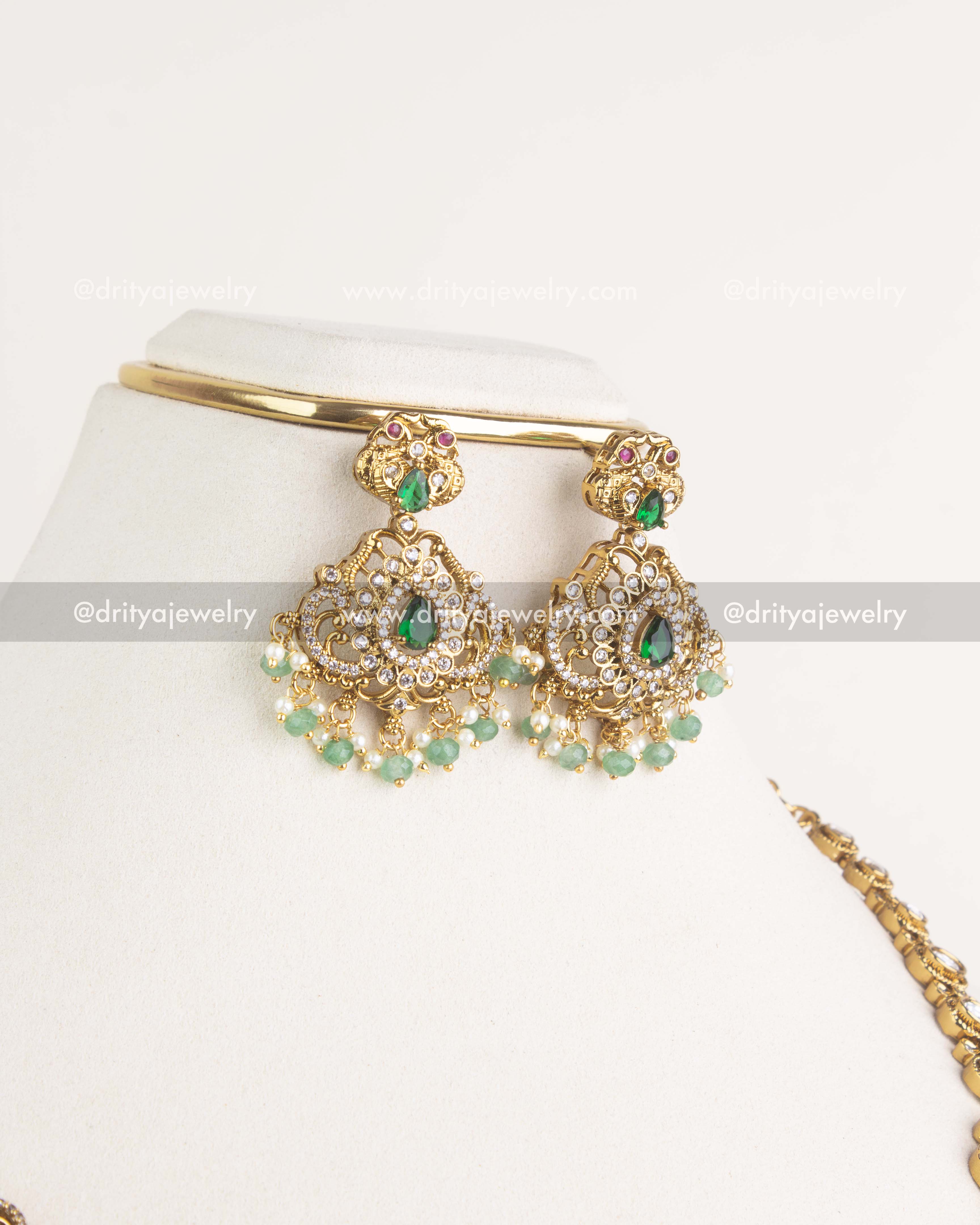 Front view of matching green stone and kundan drop earrings from layered idol necklace set, SKU 1156-G - Earrings - Front View