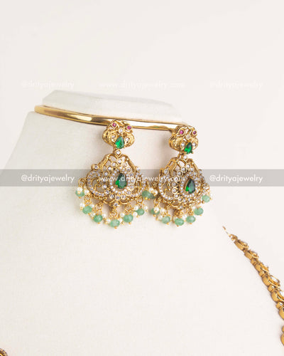 Front view of matching green stone and kundan drop earrings from layered idol necklace set, SKU 1156-G - Earrings - Front View