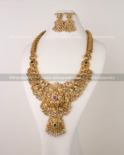 1310 - Full view of premium antique gold bridal long haram necklace set with matching earrings