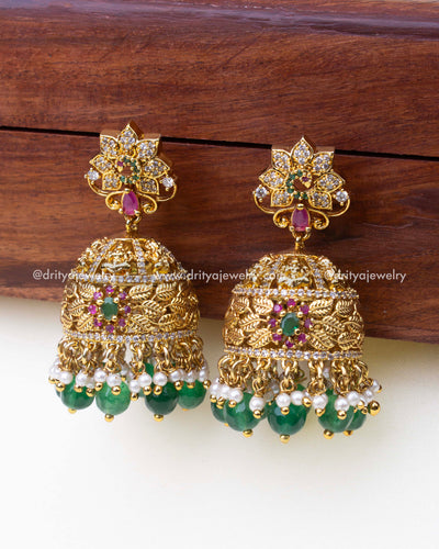 1241-G big size temple jhumka earrings front view showing leaf design and green bead drops