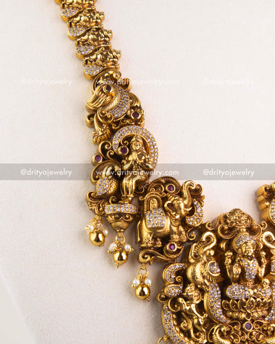 1253 - Side detail of temple necklace showing sculpted figurines and stone-studded work