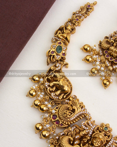 SKU 1250 side view of temple necklace showing elephant and peacock motifs with bead drops