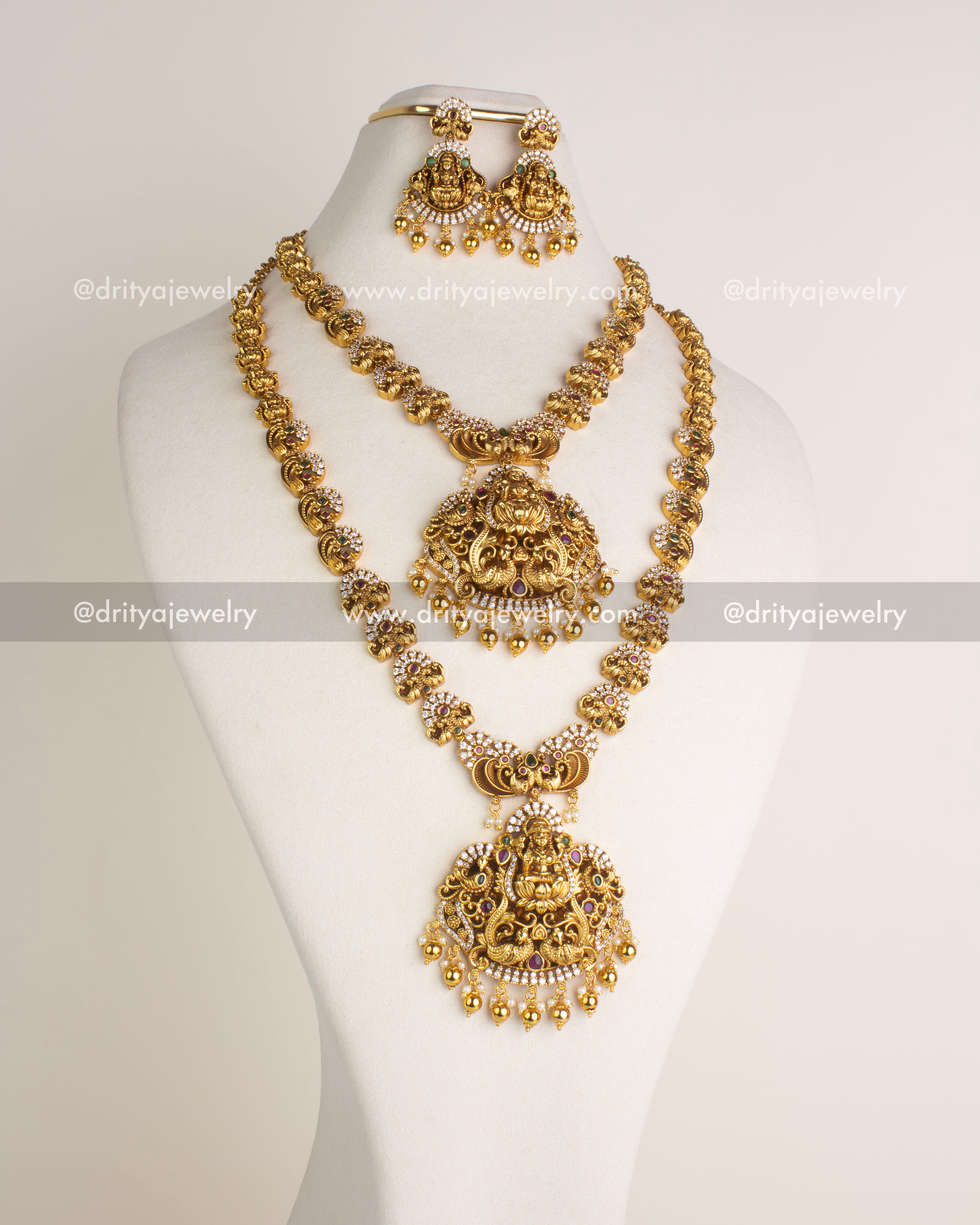 SKU 1163 Necklace Set front view with layered god idol pendants and earrings displayed on bust