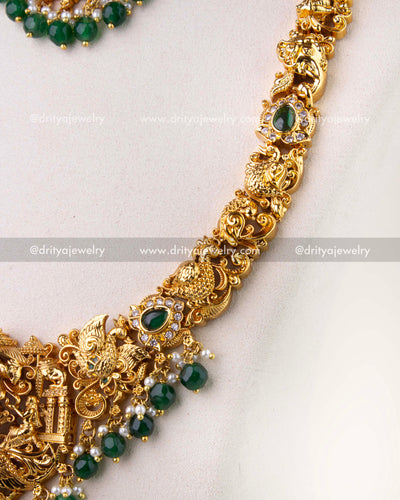 1270-G side view of god idol temple necklace with emerald green bead drops