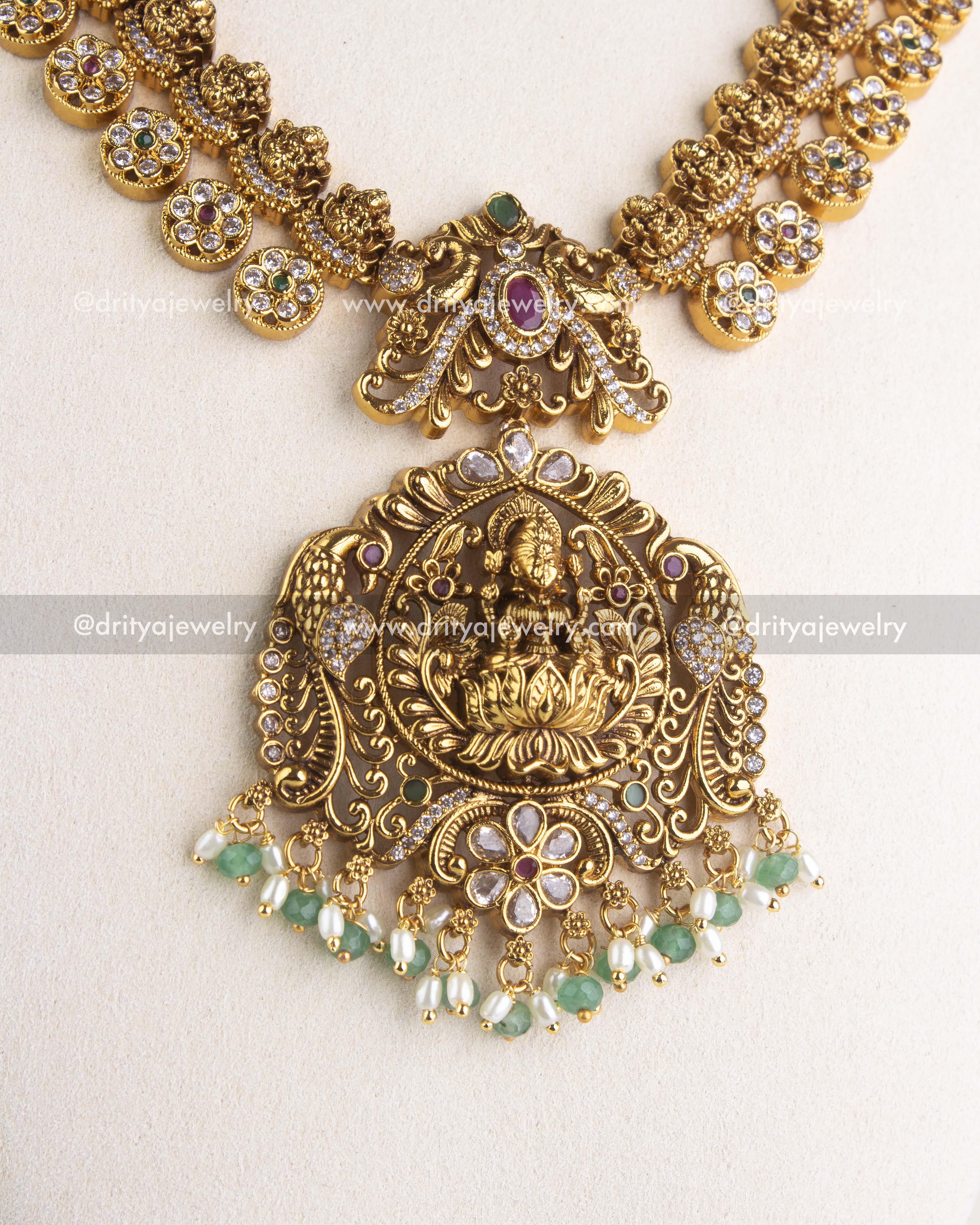 SKU 1186 Necklace Set detailed view of central god idol pendant with bead drops