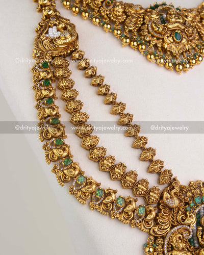 Side view of layered long temple necklace chains with green stones and motifs 1244-SET