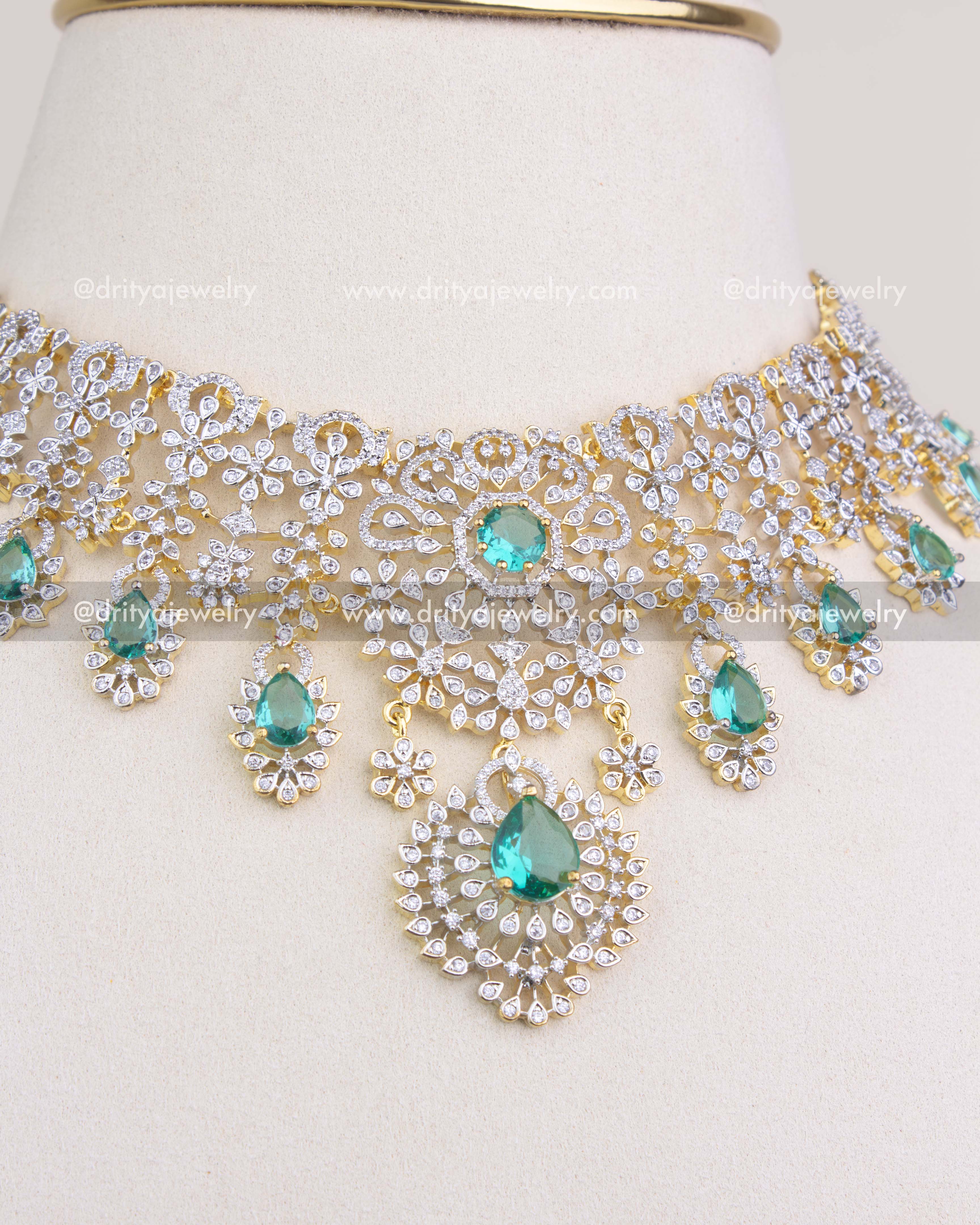 1227 - Center pendant detail of emerald and CZ short necklace