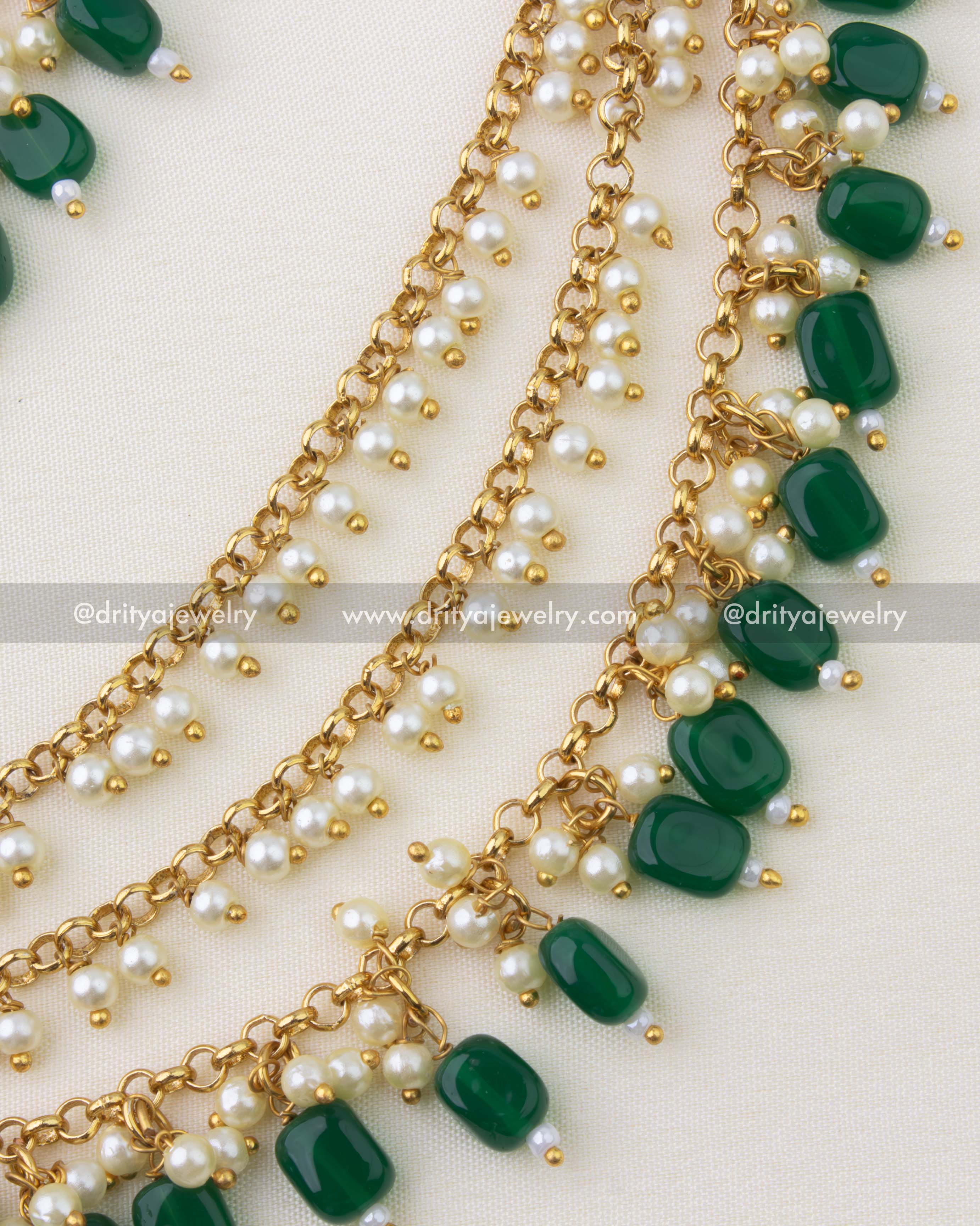 SKU 1292 detailed view of layered pearl strands with emerald bead drops on gold-toned chains