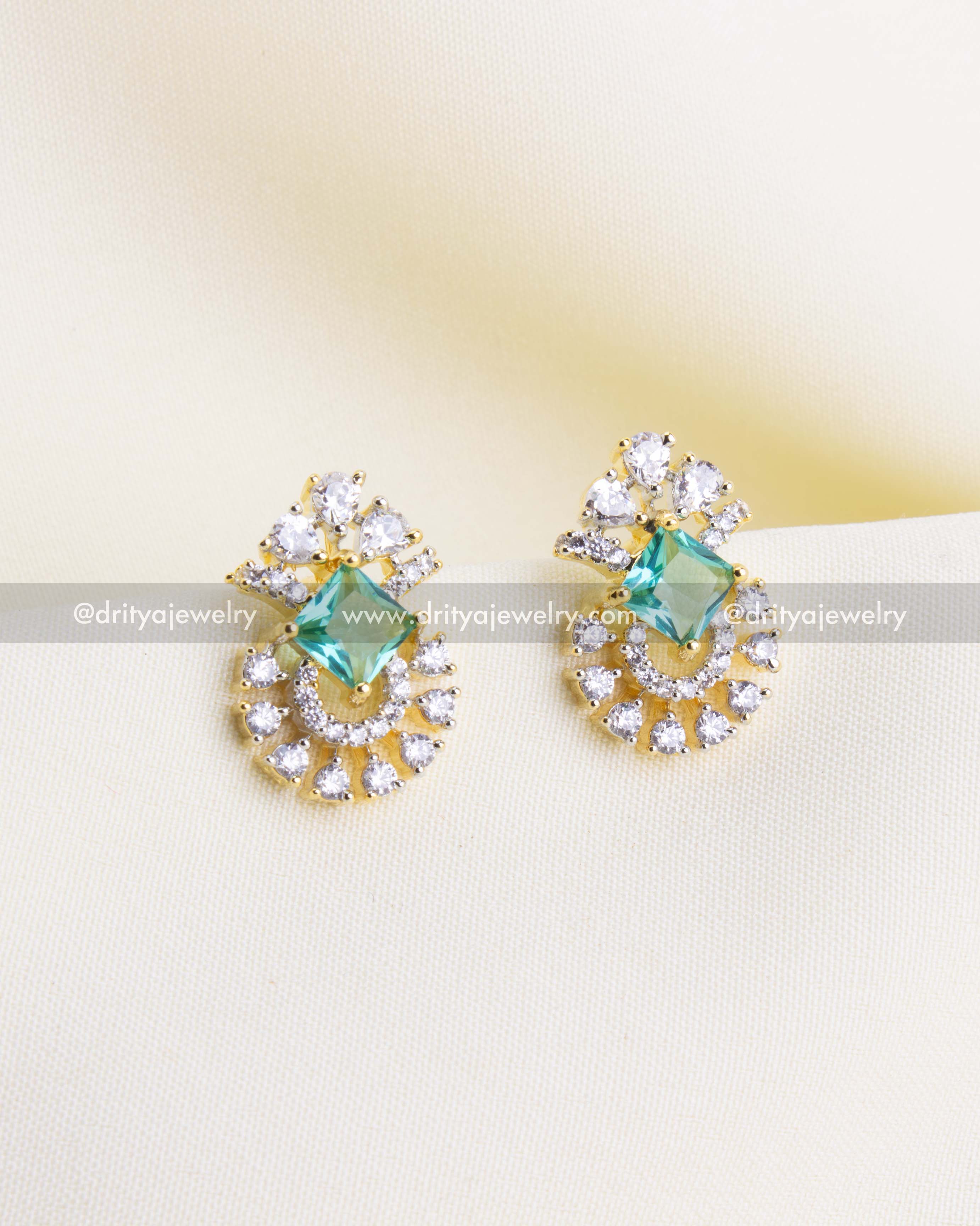 1196-MG emerald CZ stud earrings front view