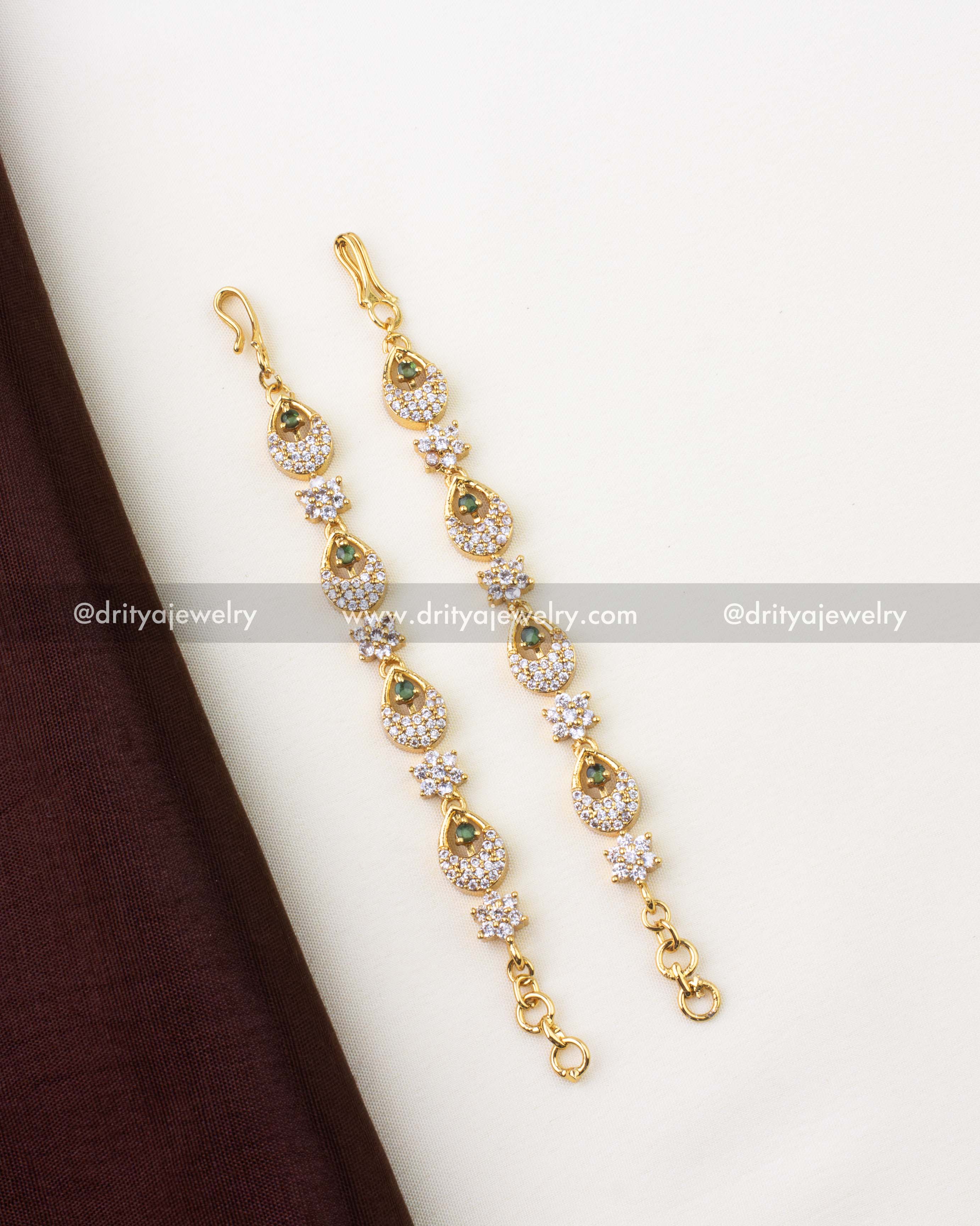 1302-G premium gold matilu hair chain pair with CZ and emerald stones full view