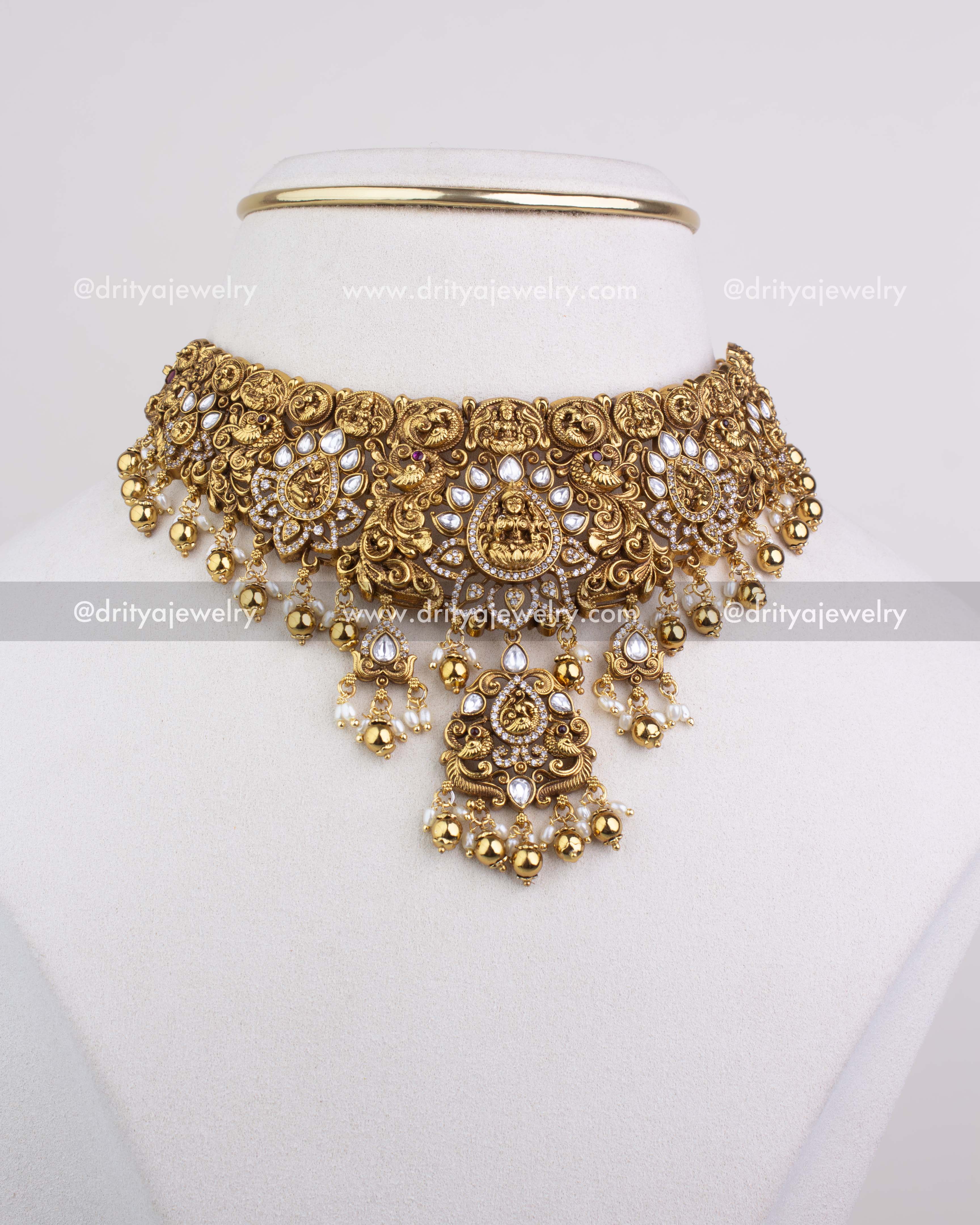 SKU 1251 full front view of antique gold temple choker necklace set on display