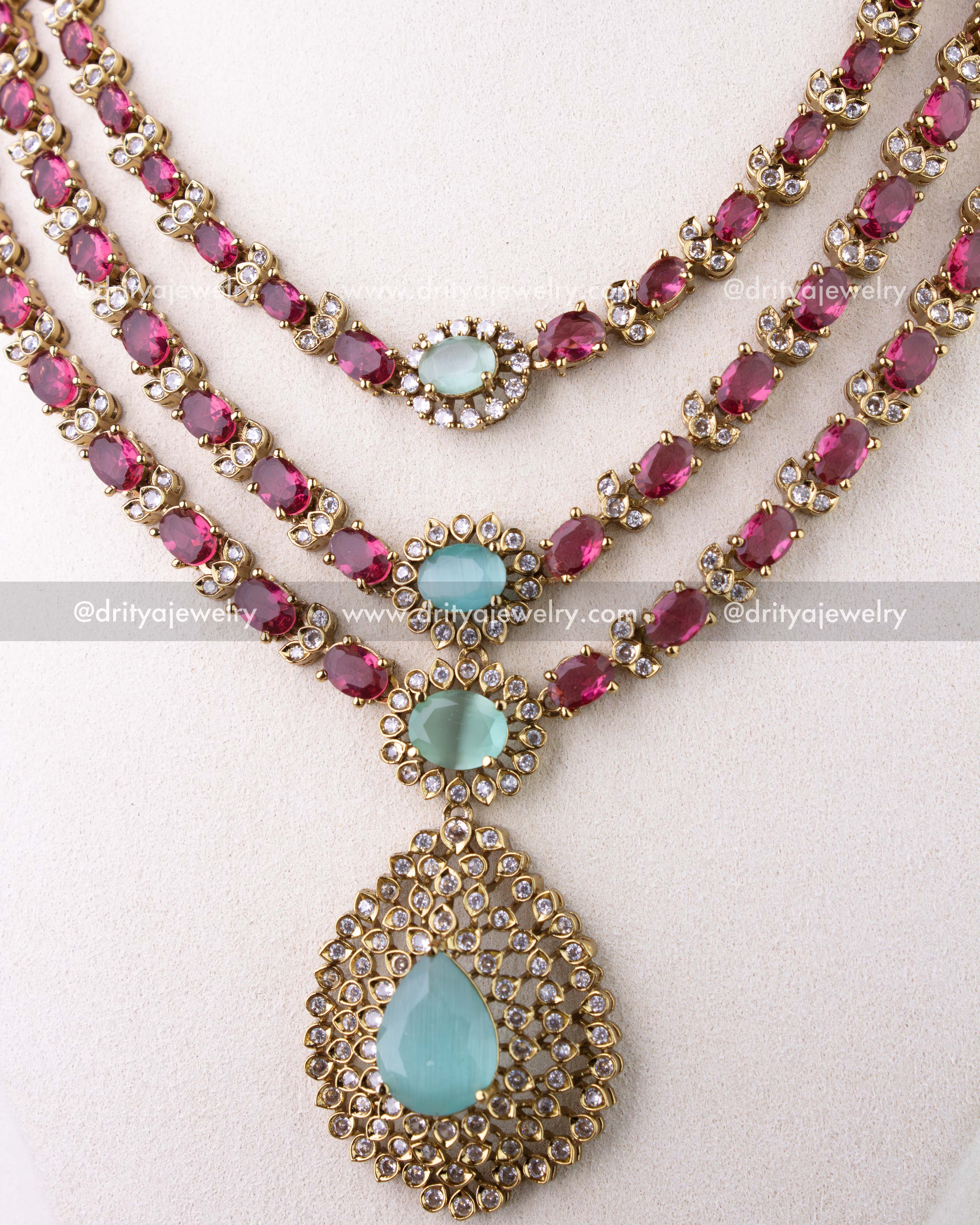 1296-R close-up of layered necklace with mint green center stones and pendant
