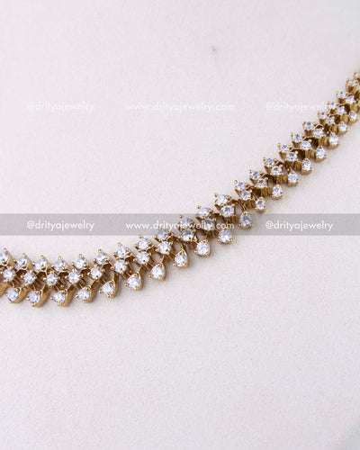 SKU 1304 - Detailed close-up of double-row CZ stone setting on necklace