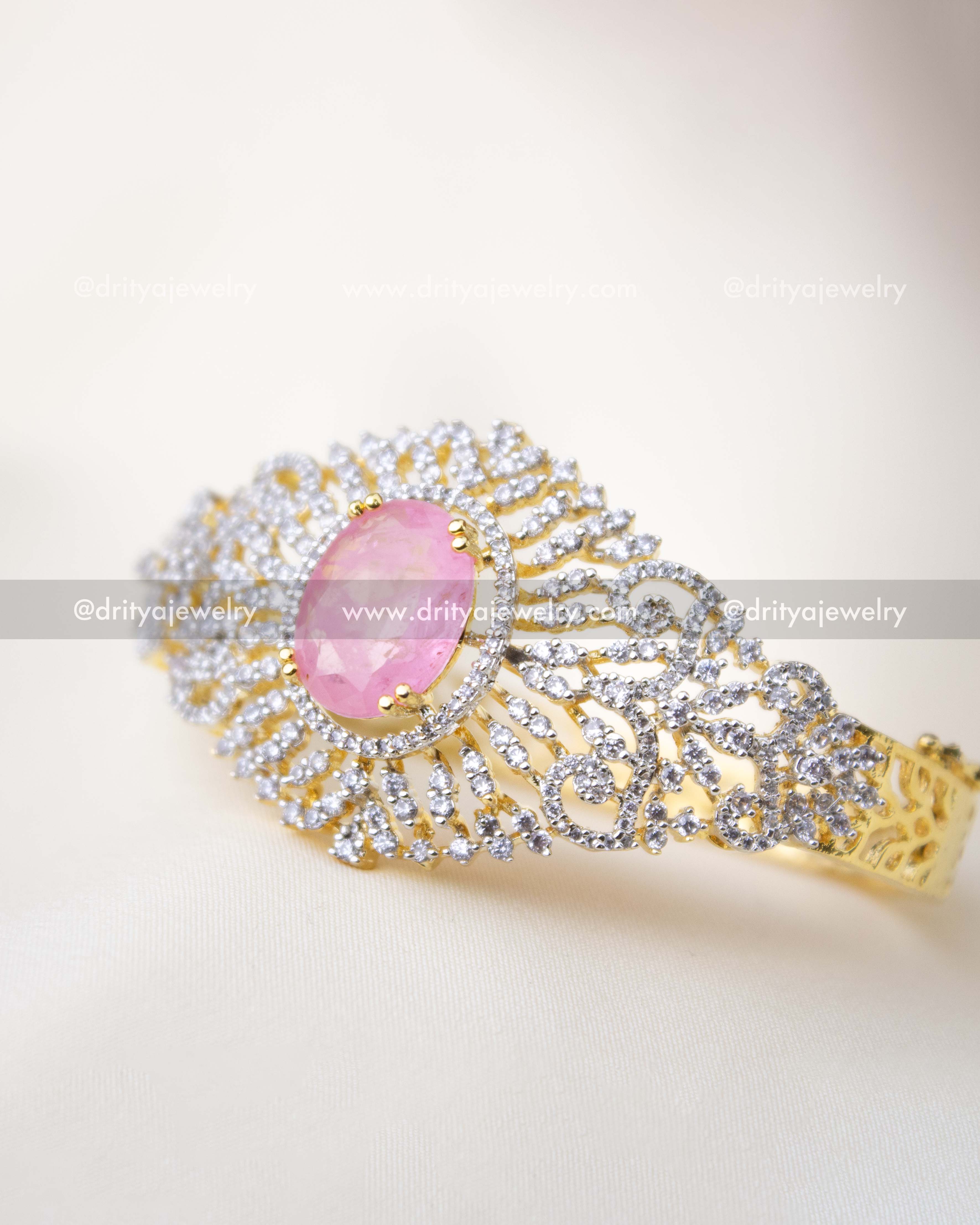 Close-up of diamond replica kada showing intricate stone-studded pattern around pink centerpiece, SKU 1295-BP